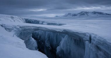 Snow bridge spanning a glacial crevasse, illustrating the article on participant-funded split dollar